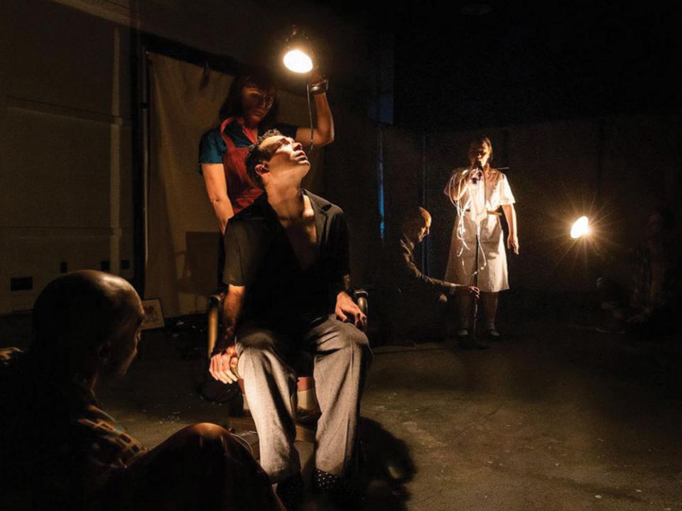 From left: Maurice Emmanuel Parent, Kari Buckley, Eddie Shields (seated), Nael Nacer, and Helen Hy-Yuen Swanson in Central Square Theater-Bedlam production of "Angels in America: Millennium Approaches" at Central Square Theater.NILE SCOTT STUDIOS